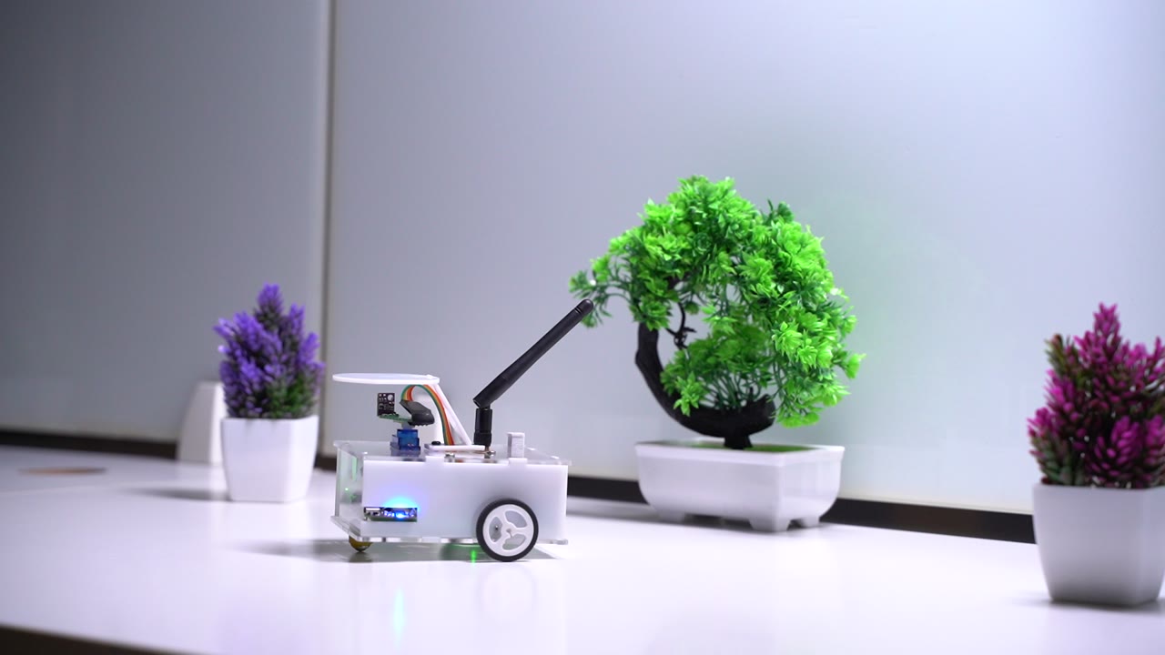 NeoROSbot driving across a desk